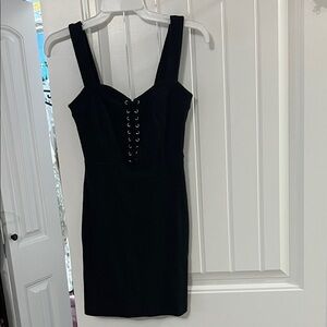 Elegant Black Dress with Lace-Up Detail